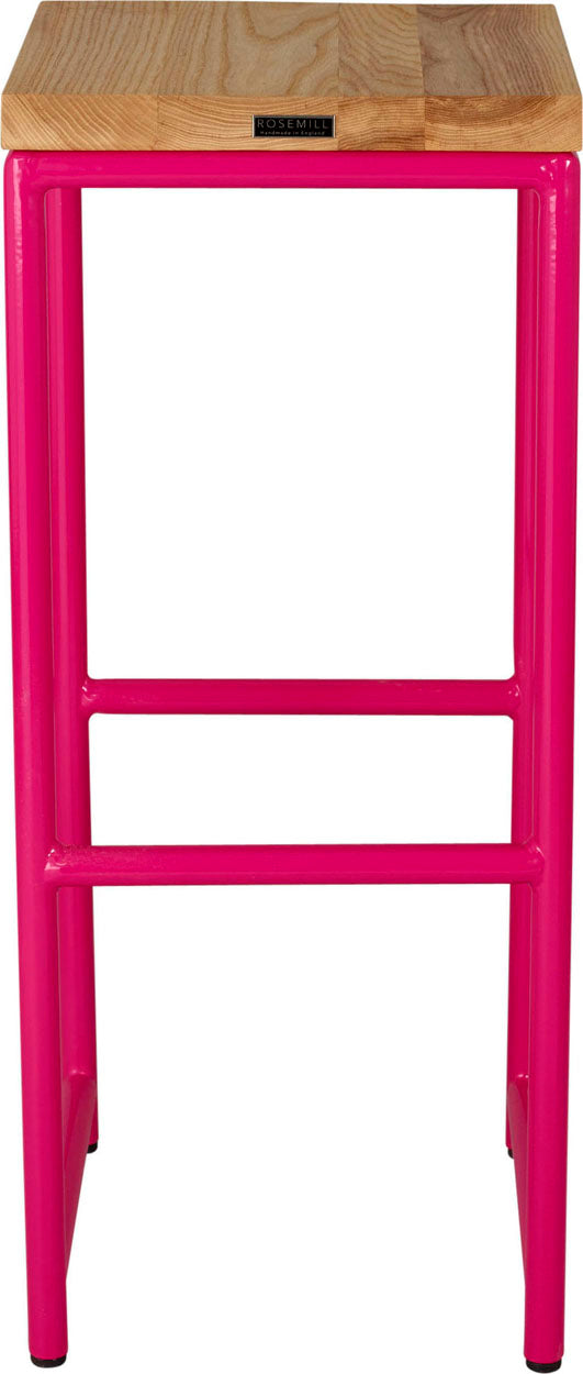 Hot pink metal stool with natural stain ash wood made in UK - side view round frame