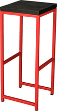 Load image into Gallery viewer, Red metal stool with black stain ash wood made in UK - angle view square frame
